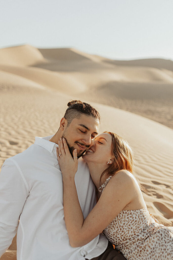 Engagement session in the sand dunes of California. 