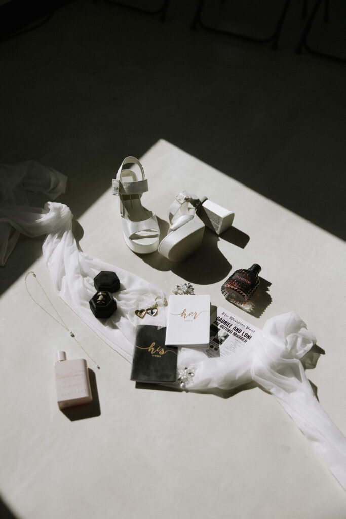 wedding shoes, wedding rings, vow books 