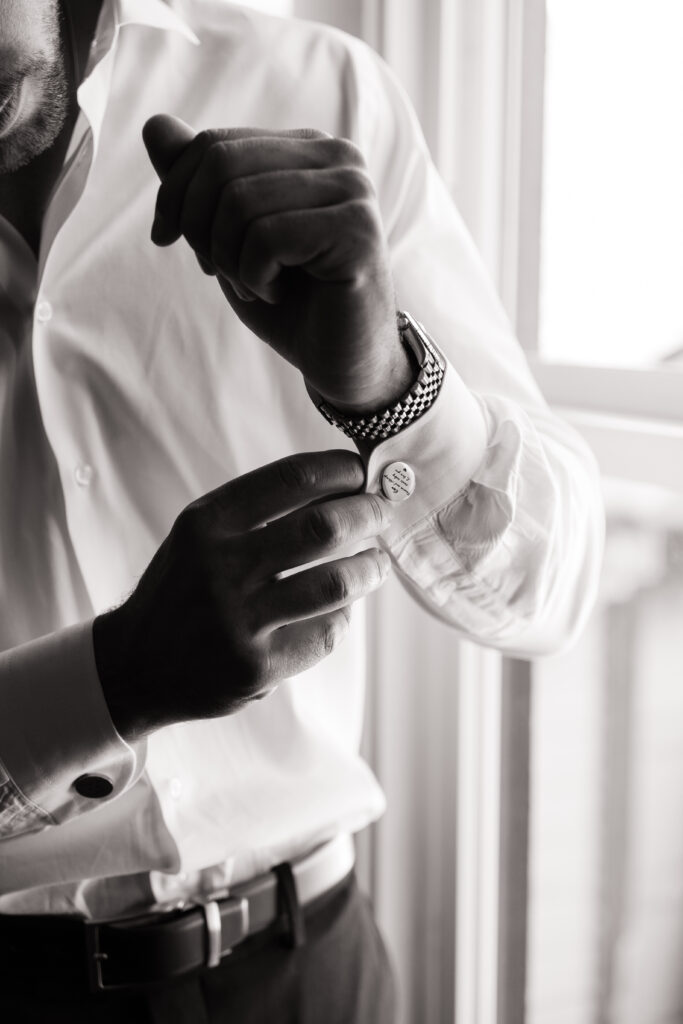 groom's wedding details, cufflinks, watch, white button down