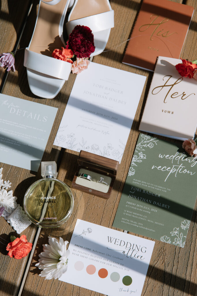 Wedding details, vow books, purfume, florals, rings