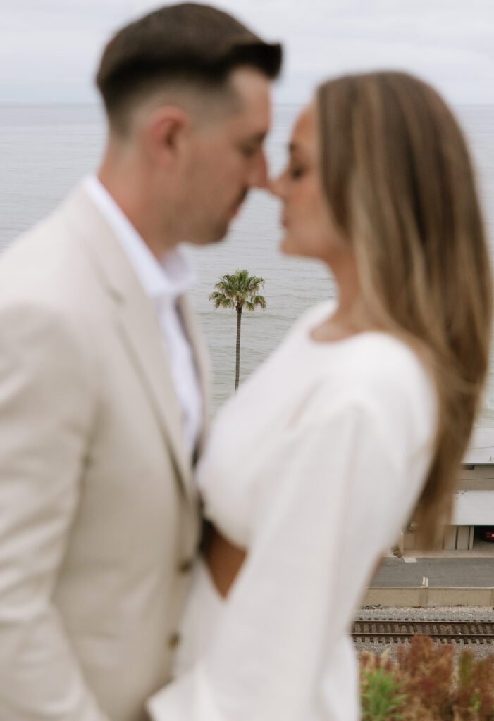 Orange County proposal photographer documents surprise beach house proposal with golden hour lighting and ocean views