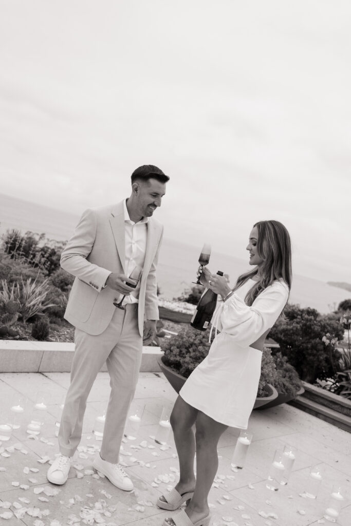 Luxury proposal photographer captures intimate couples portraits at private San Clemente beach house rental