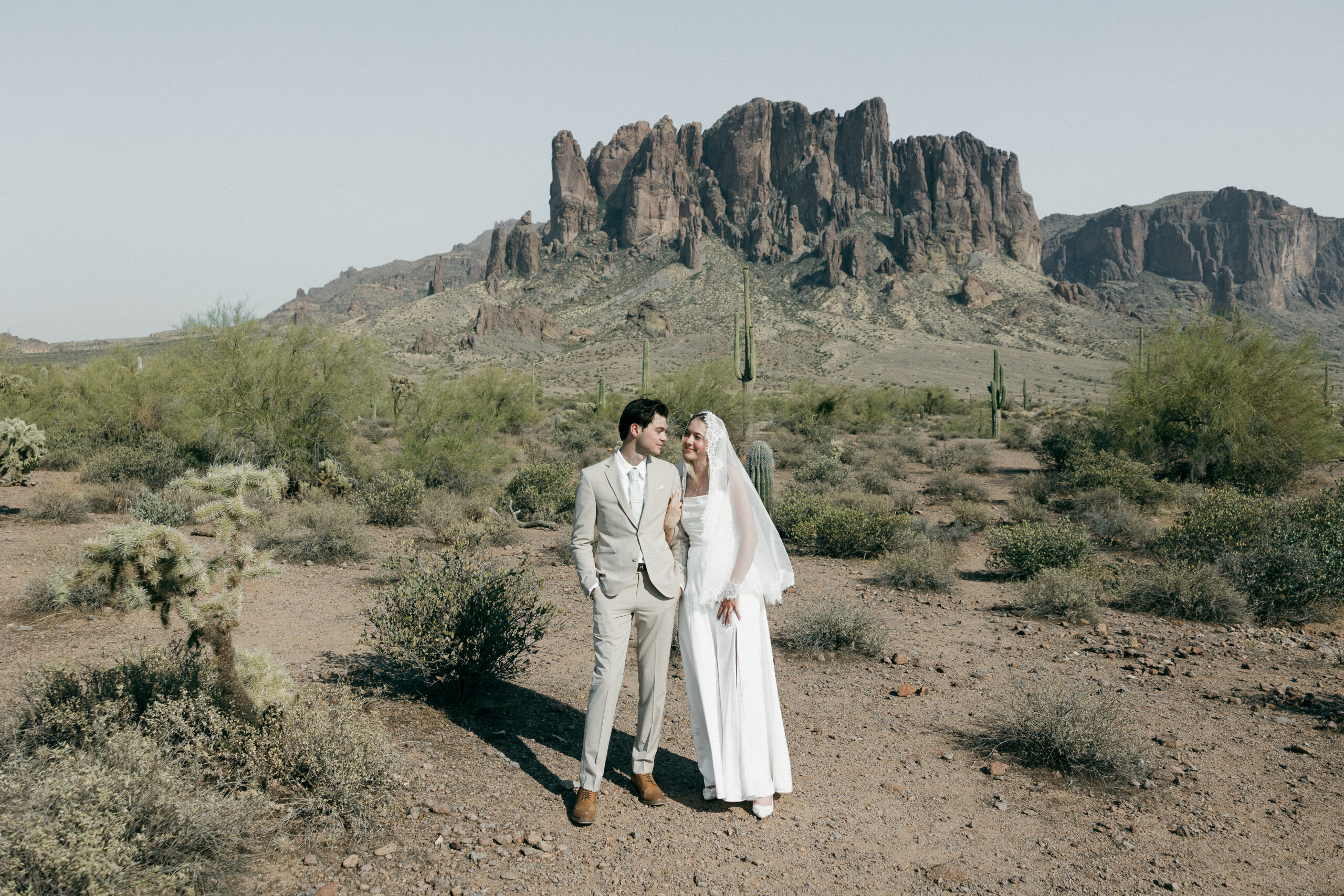 We captured an intimate elopement ceremony at the Superstition Mountains in Arizona. The bride and groom wanted their wedding to be a bit more personal. The setting was perfect for them as they said their vows in the middle of the Arizona desert during mid afternoon.