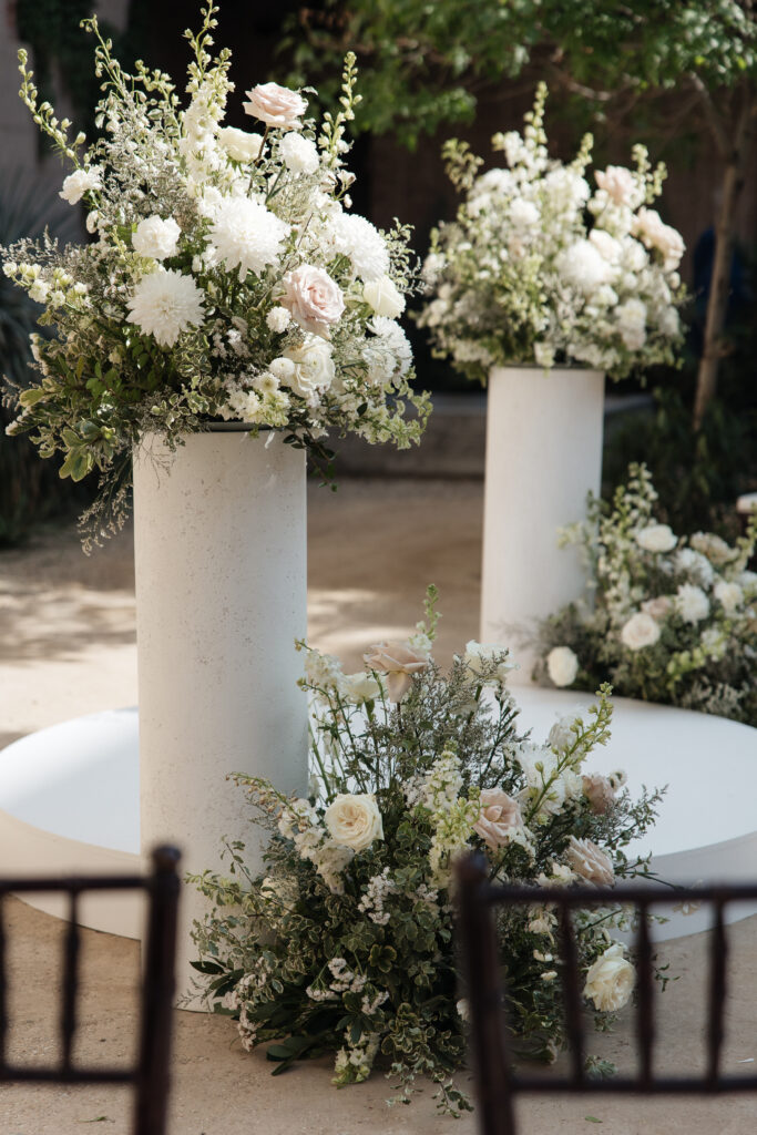 Luxury wedding photography showing ceremony florals at Arizona venue