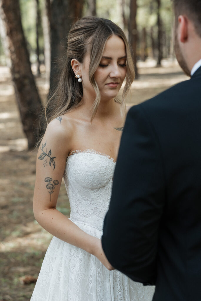 Timeless images of first look at Flagstaff Arizona wedding Nordic Village