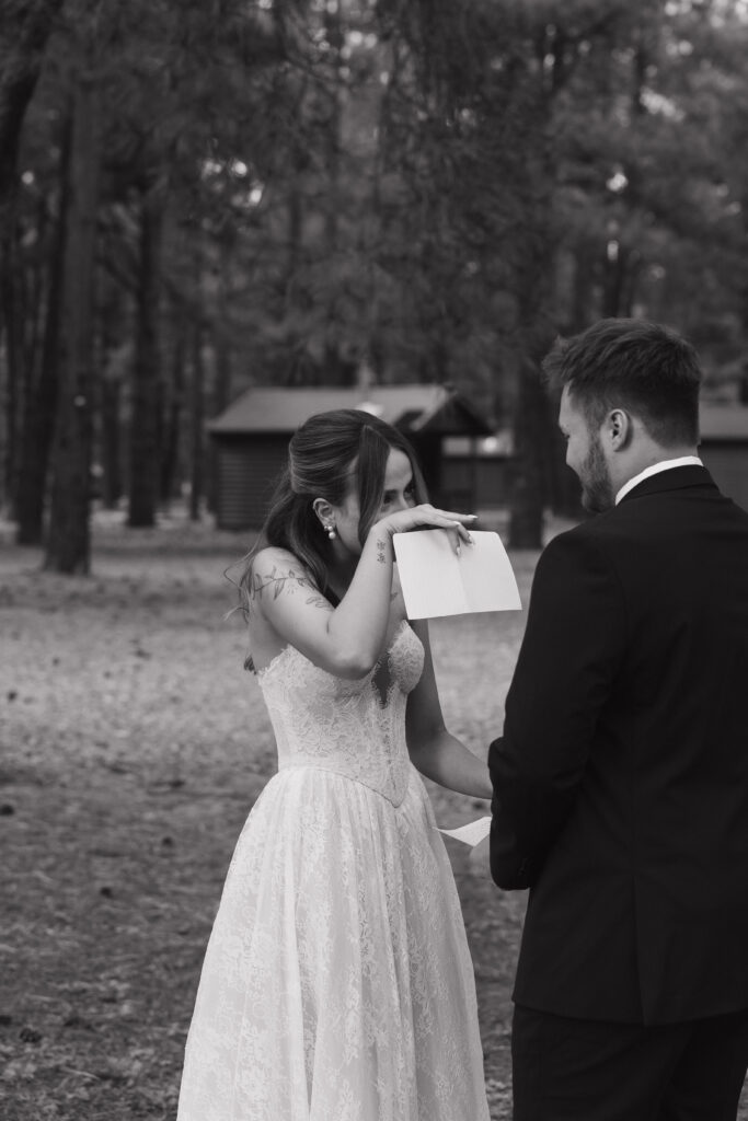 Timeless images of first look at Flagstaff Arizona wedding Nordic Village