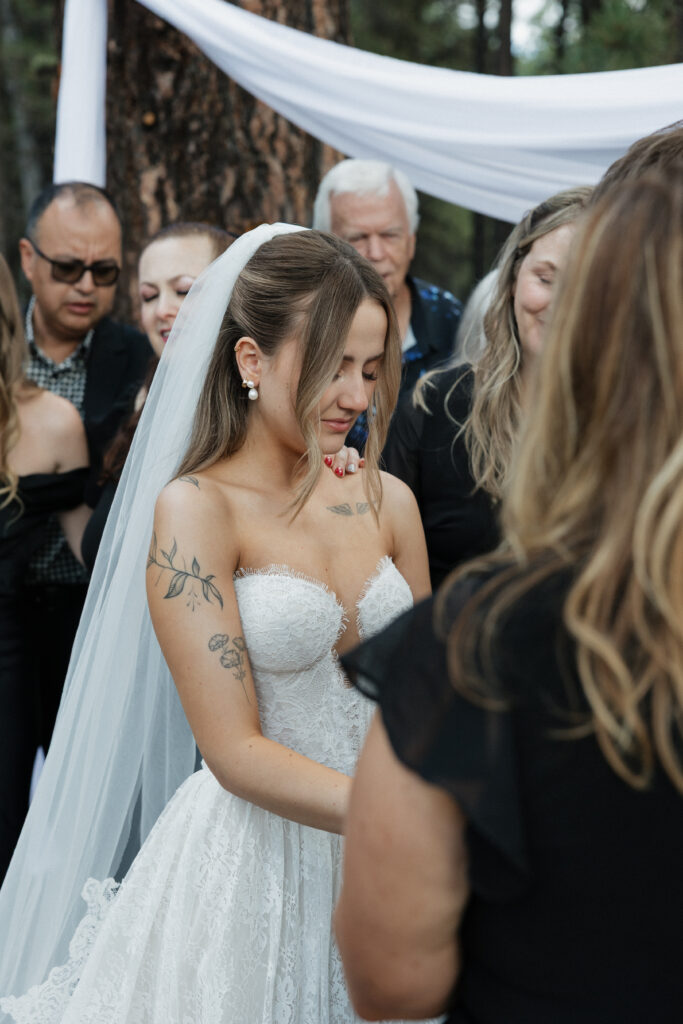 Timeless Flagstaff Arizona wedding ceremony at Nordic Village with intimate family prayer