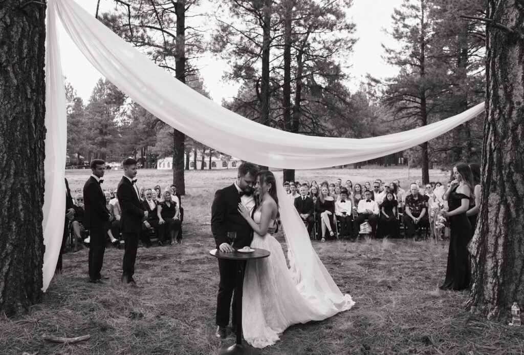 Bride and groom exchanging vows timeless Flagstaff Arizona wedding Nordic Village