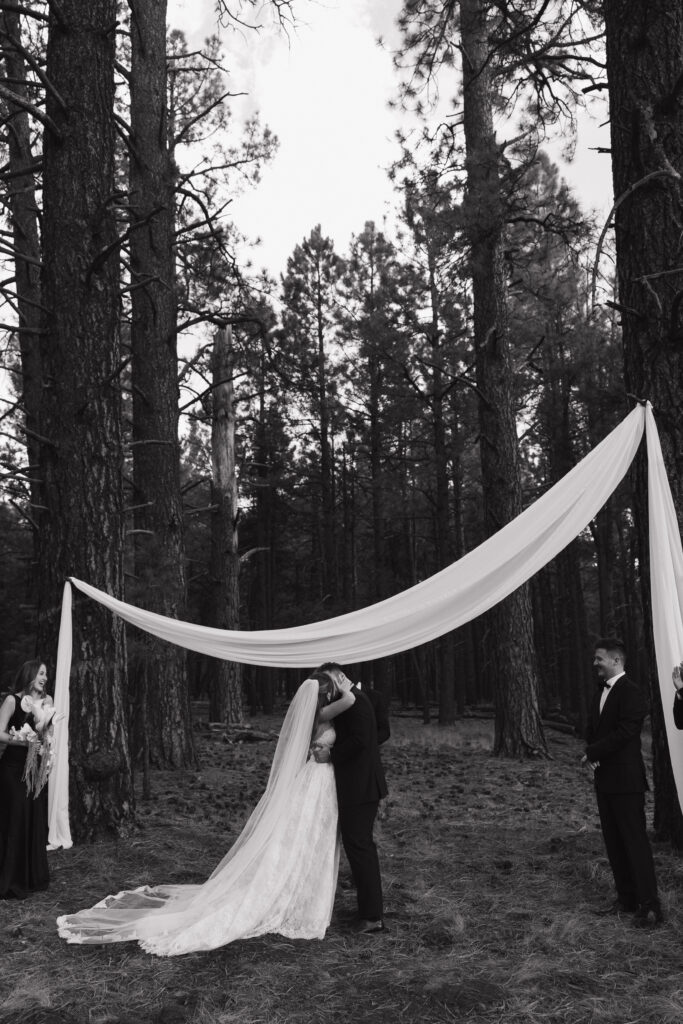 Bride and groom exchanging vows timeless Flagstaff Arizona wedding Nordic Village