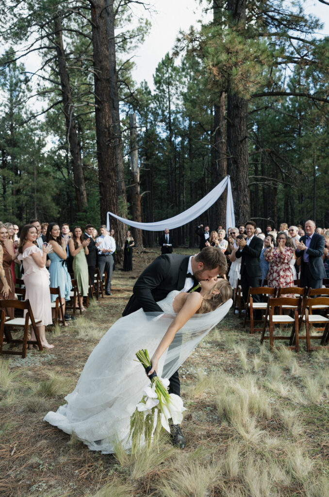 Bride and groom exchanging vows timeless Flagstaff Arizona wedding Nordic Village