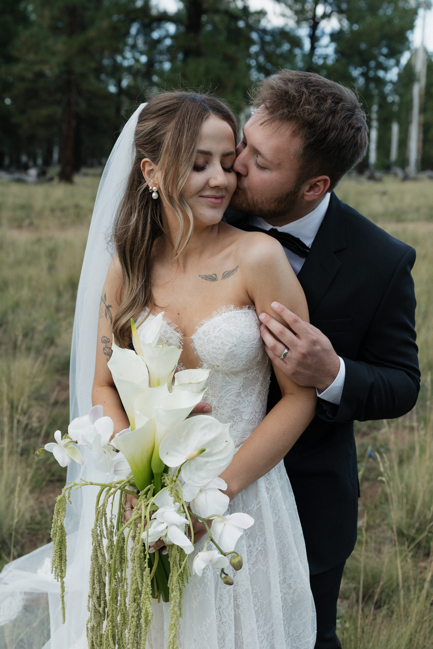 Bride and groom portraits at Nordic Village venue in Flagstaff Arizona
