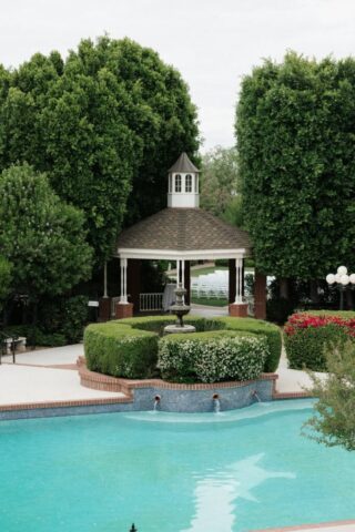 Outdoor wedding ceremony at Stonebridge Manor Mesa Arizona garden estate