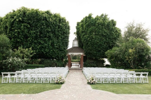 Outdoor wedding ceremony at Stonebridge Manor Mesa Arizona garden estate
