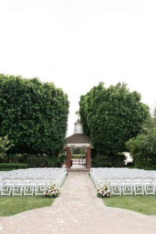 Outdoor wedding ceremony at Stonebridge Manor Mesa Arizona garden estate