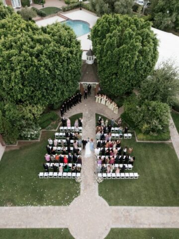 Aerial drone photo of Stonebridge Manor wedding venue Mesa Arizona showing estate gardens and pool
